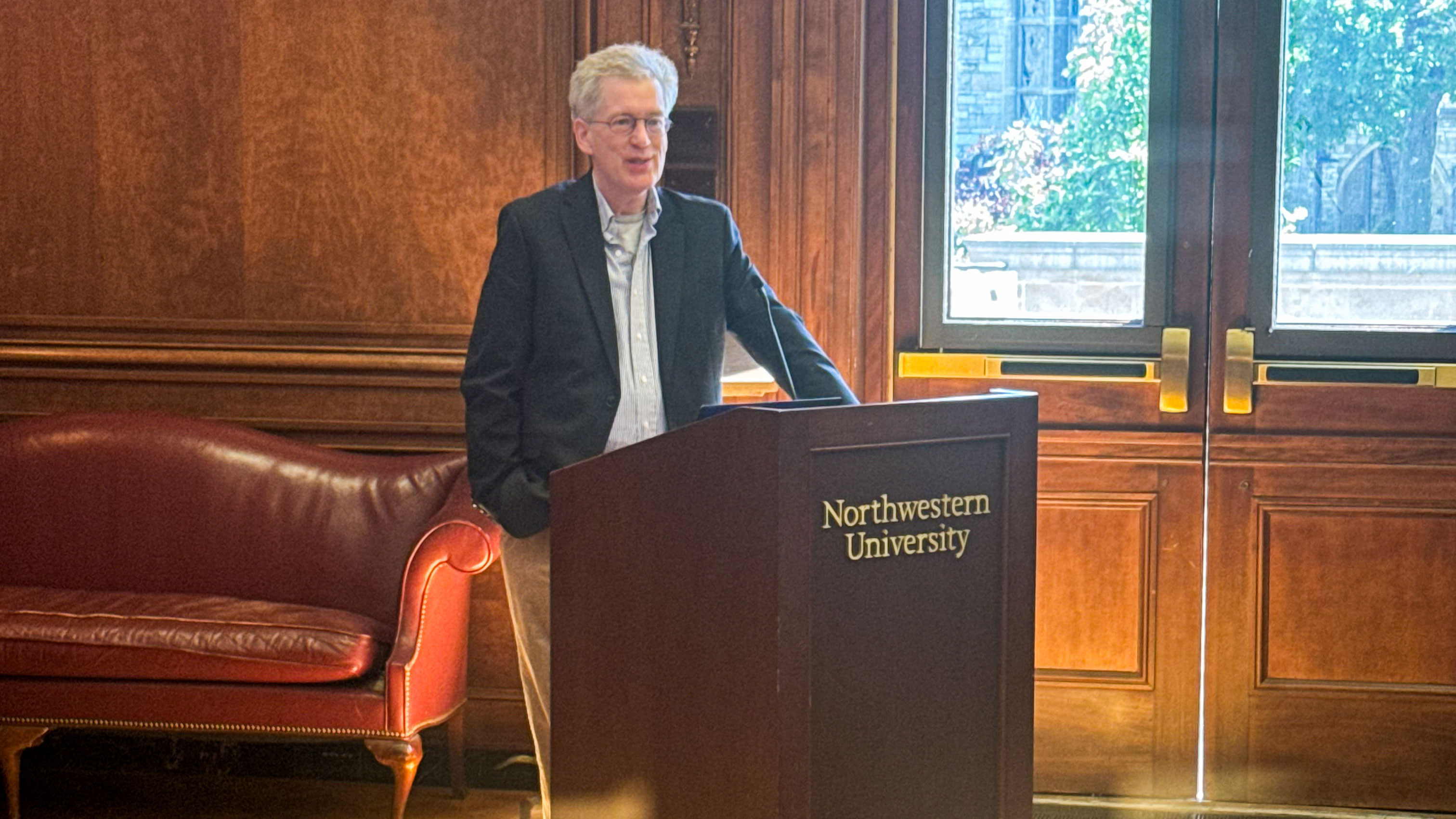 Dept. Chair Kevin Boyle gives introduction during Honor's Thesis Seminar May 2024